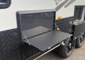 2024 Titan Blackhawk Tourer 720 Tardis caravan exterior view showing the mud tyres.