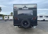 2024 Titan Blackhawk Tourer 720 Tardis caravan exterior view showing the spare wheel.