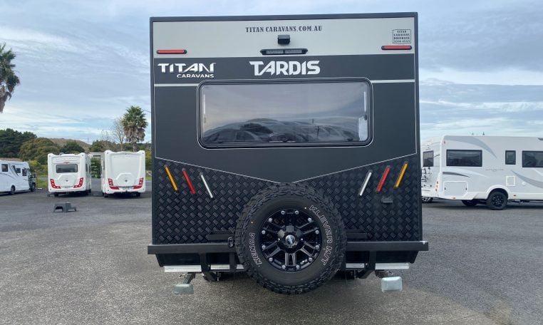 2024 Titan Blackhawk Tourer 720 Tardis caravan exterior view showing the spare wheel.