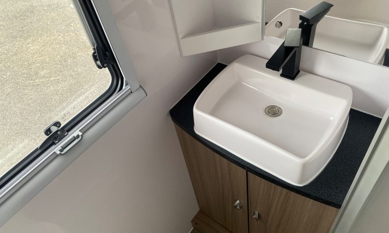 2024 Titan Blackhawk Tourer 720 Tardis bathroom showing the handbasin.