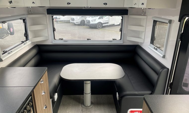 2024 Titan Blackhawk Tourer 720 Tardis caravan interior view showing the club lounge.