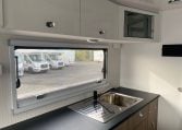 2024 Titan Blackhawk Tourer 720 Tardis caravan interior view showing the kitchen.
