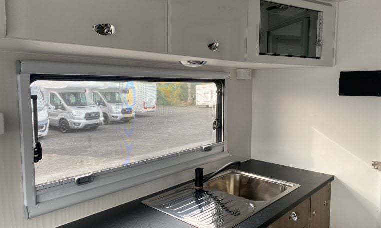 2024 Titan Blackhawk Tourer 720 Tardis caravan interior view showing the kitchen.