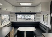 2024 Titan Blackhawk Tourer 720 Tardis caravan interior view showing the overhead cabinets.