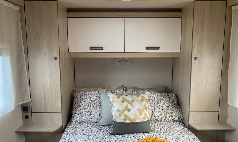 2023 Auto-Trail F-Line F74 motorhome interior view showing the bedroom overhead storage.