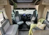 2023 Auto-Trail F-Line F74 motorhome interior view showing the front lounge with cab swivel seats.