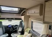 2023 Auto-Trail F-Line F74 motorhome interior view showing the front lounge overhead storage.