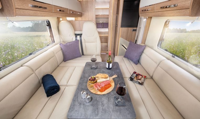 Auto-Trail Grand Frontier GF88 motorhome interior view with full dining and lounge.