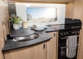 Auto-Trail Grand Frontier GF88 motorhome interior view showing the kitchen with hob and oven.