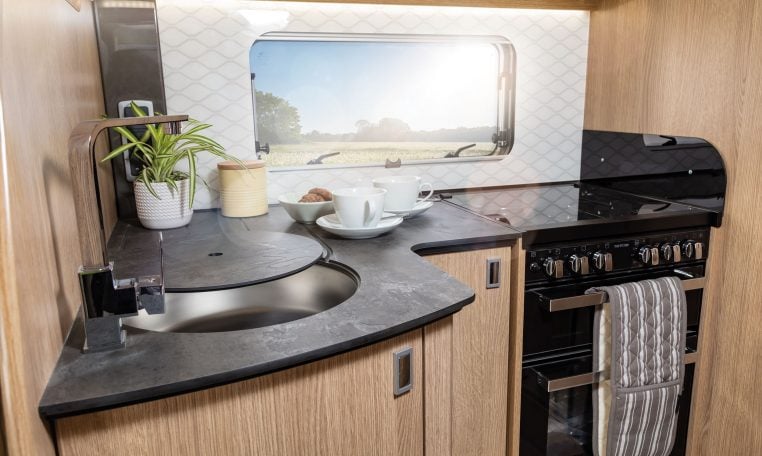 Auto-Trail Grand Frontier GF88 motorhome interior view showing the kitchen with hob and oven.