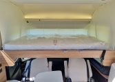 Fiat Ducato Pilote G740FC motorhome interior view showcasing the drop-down bed.