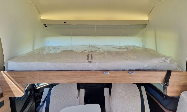 Fiat Ducato Pilote G740FC motorhome interior view showcasing the drop-down bed.