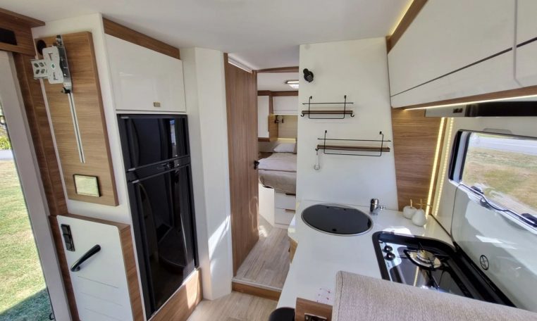 Fiat Ducato Pilote G740FC motorhome interior view of the kitchen showcasing the fridge.