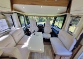 Fiat Ducato Pilote G740FC motorhome interior view showcasing the front dining.