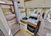 Fiat Ducato Pilote G740FC motorhome interior view showcasing the kitchen layout.