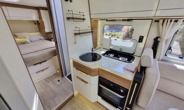 Fiat Ducato Pilote G740FC motorhome interior view showcasing the kitchen layout.