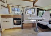 Fiat Ducato Pilote G740FC motorhome interior view showcasing the living area layout.