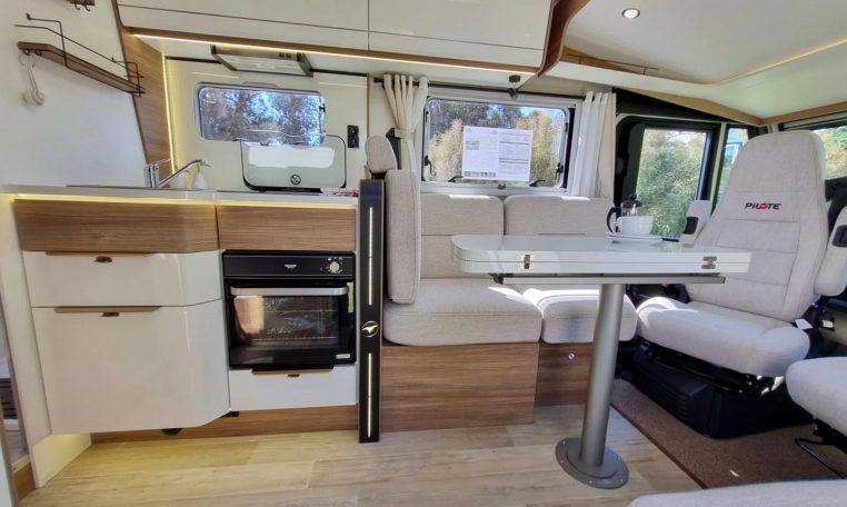 Fiat Ducato Pilote G740FC motorhome interior view showcasing the living area layout.