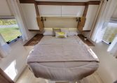 Fiat Ducato Pilote G740FC motorhome interior view showcasing the rear island bed.