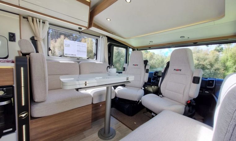 Fiat Ducato Pilote G740FC motorhome interior view showcasing the swivel cab seats.