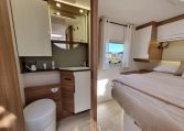 Fiat Ducato Pilote G740FC motorhome interior view showcasing the compact toilet.
