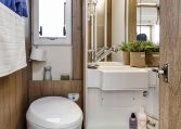 Clean, compact toilet setup in the Roller Team Auto-Roller 747, designed for comfort and space efficiency.