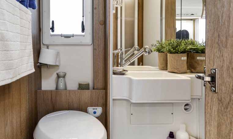 Clean, compact toilet setup in the Roller Team Auto-Roller 747, designed for comfort and space efficiency.