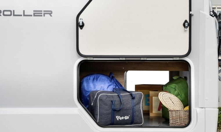 Rear storage in a Roller Team Auto-Roller 747 motorhome for storing equipment and luggage.