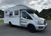 Side view of a Roller Team Zefiro 665 motorhome showing the driver's door.