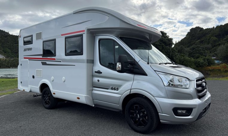 Side view of a Roller Team Zefiro 665 motorhome showing the driver's door.