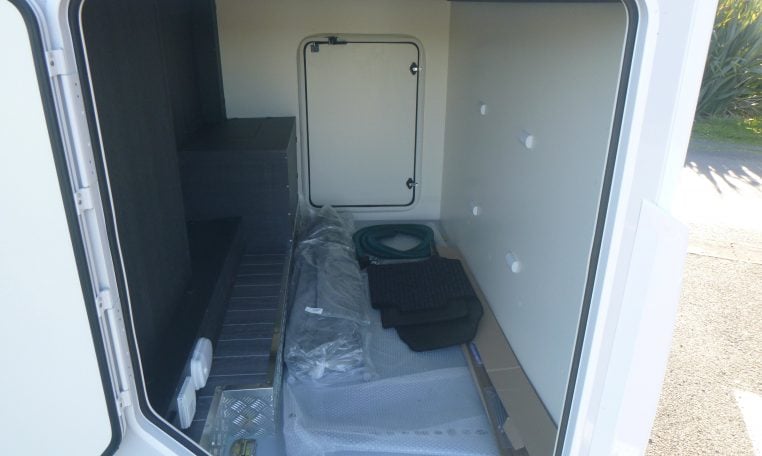 Large boot in a Roller Team Zefiro 665 motorhome for storing equipment and luggage.